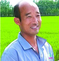 全国十佳农民：耕300多亩田 养1000多头猪