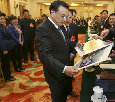 李克强打断刘永好发言：报告我全看了 我问你回答